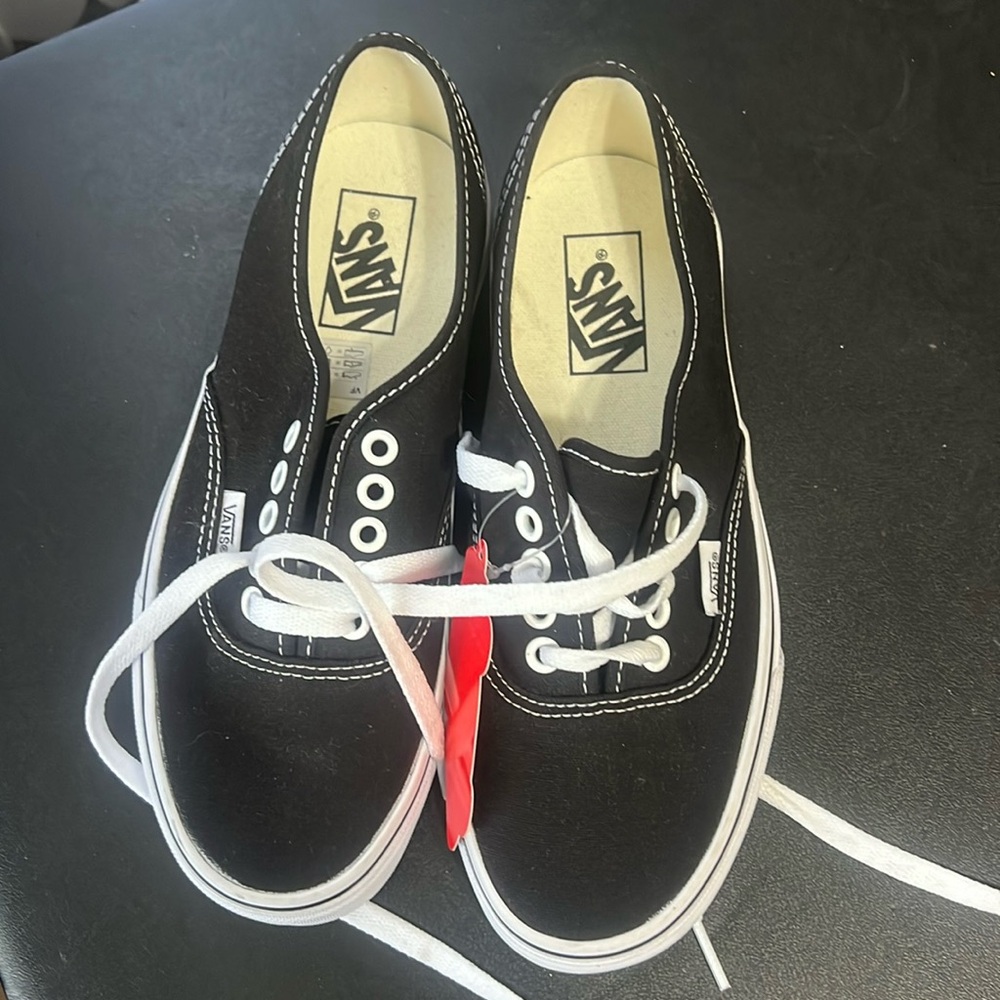 Never worn new Vans. Woman’s size 8